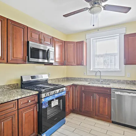 Rent this 1 bed apartment on Frederick Douglass High School in Windsor Avenue, Baltimore