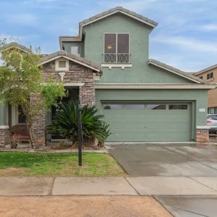Buy this 4 bed house on 5345 East Harmony Avenue in Mesa, AZ 85206