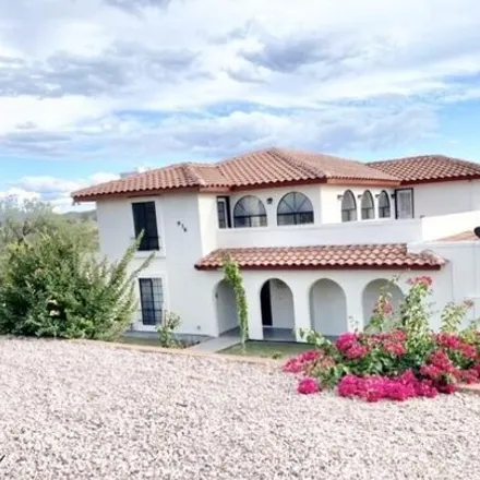 Buy this 4 bed house on 992 North Ridgeline Drive in Nogales, AZ 85621