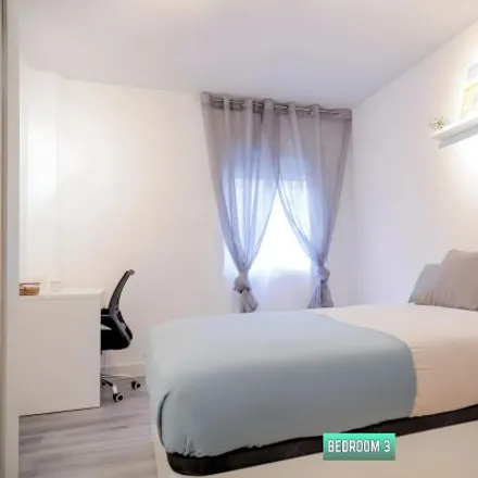 Rent this 3 bed room on Calle de Ramón Luján in 28026 Madrid, Spain