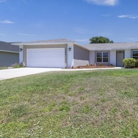 Buy this 3 bed house on 3228 Southeast Pinto Street in Port Saint Lucie, FL 34984