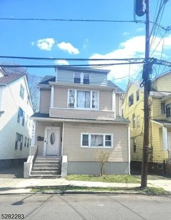 Buy this 8 bed house on 106 Grand Avenue in Newark, NJ 07106