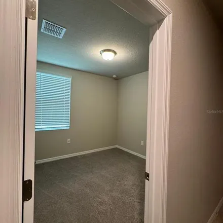 Rent this 3 bed apartment on Carnostie Road in Winter Haven, FL 33884