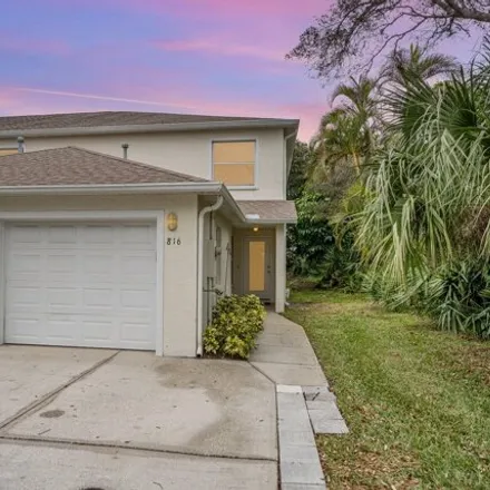 Buy this 3 bed townhouse on 858 Mimosa Place in Indian Harbour Beach, Brevard County