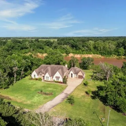 Buy this 6 bed house on 3053 Wellspring Lake Drive in Weston Lakes, TX 77441