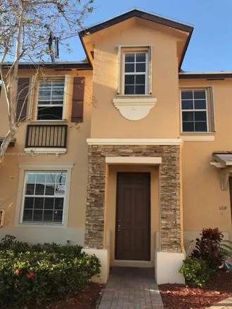 Rent this 2 bed townhouse on 3355 Northeast 13th Circle Drive in Homestead, FL 33033