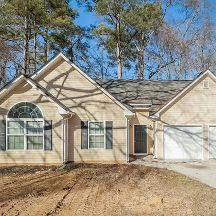 Rent this 4 bed house on 1590 Greenwillow Drive in Conley, Clayton County