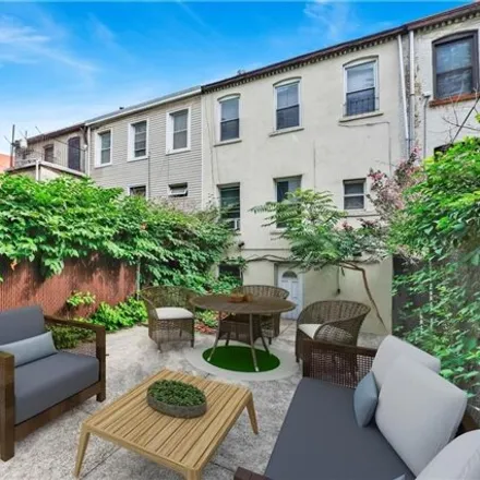 Buy this 4 bed house on 218 9th Street in New York, NY 11215