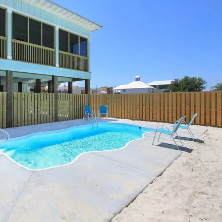Buy this 4 bed house on 346 East 1st Avenue in Gulf Shores, AL 36542
