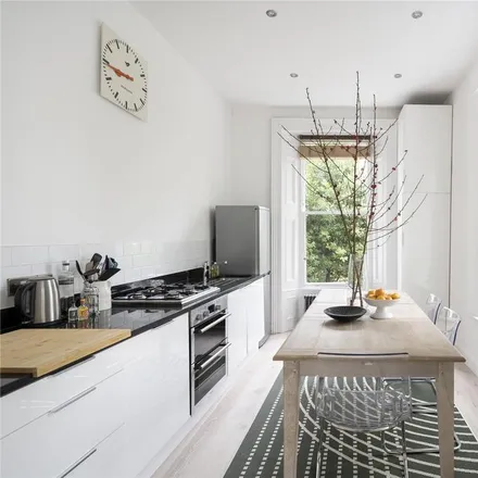 Rent this 2 bed townhouse on 83 Ladbroke Grove in London, W11 2HF