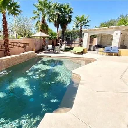 Buy this 5 bed house on 3699 Fair Bluff Street in Summerlin South, NV 89135