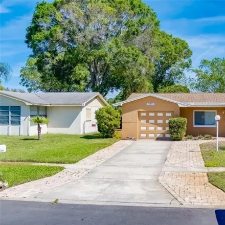 Rent this 3 bed house on 9379 Temple Avenue in Seminole, FL 33772
