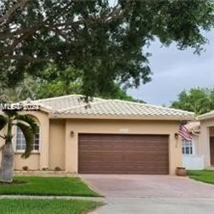 Rent this 3 bed house on 12297 Natalies Cove Road in Cooper City, FL 33330