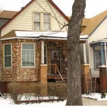 Buy this 4 bed house on 6008 South Marshfield Avenue in Chicago, IL 60636