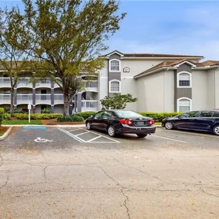 Buy this 2 bed condo on Hunter's Creek Golf Club in 14401 Sports Club Way, Orlando