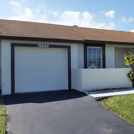 Rent this 3 bed townhouse on 15663 Bottlebrush Circle in County Club Acres, Palm Beach County