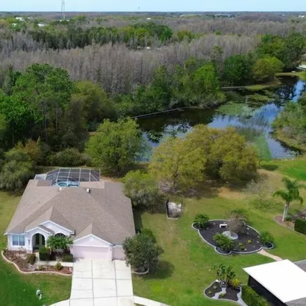 Buy this 4 bed house on 7003 Palmetto Pines Lane in Pasco County, FL 34637