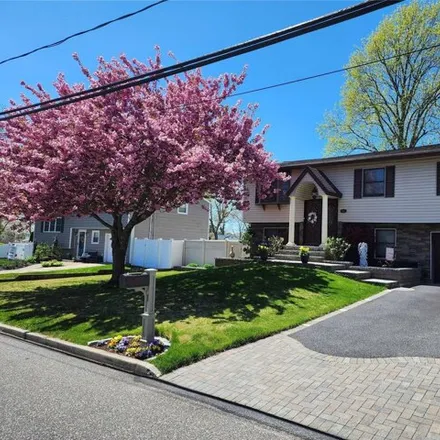 Buy this 4 bed house on 142 Ruland Rd in Selden, New York