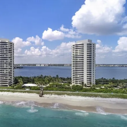 Rent this 3 bed condo on 5048 North Ocean Drive in Palm Beach Isles, Riviera Beach