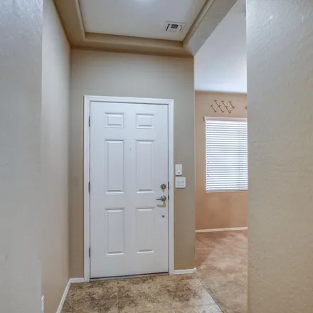 Rent this 4 bed apartment on 699 East Gold Dust Way in San Tan Valley, AZ 85143