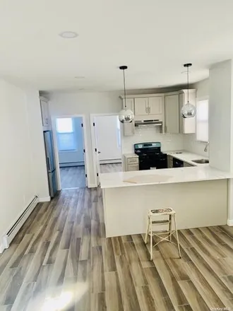 Rent this 3 bed apartment on 62-09 62nd Road in New York, NY 11379