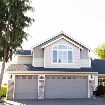 Buy this 4 bed house on 5129 Nathan Loop Southeast in Auburn, WA 98092