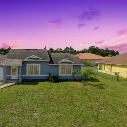 Buy this 2 bed house on 520 Davidson Street Southeast in Palm Bay, FL 32909