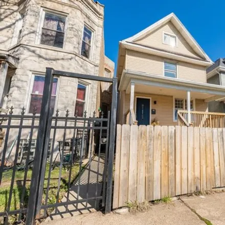 Buy this 4 bed house on 611 North Long Avenue in Chicago, IL 60651