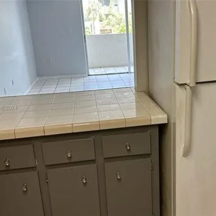 Rent this 2 bed condo on 10090 Northwest 80th Court in Hialeah Gardens, FL 33016