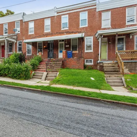 Rent this 2 bed townhouse on 526 East 30th Street in Baltimore, MD 21218