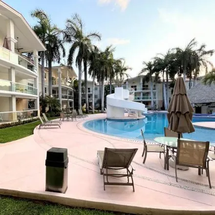 Buy this 2 bed apartment on Diamante lakes in Calle Paseo de los Manglares, Fracc. El Pueblito del Revolcadero