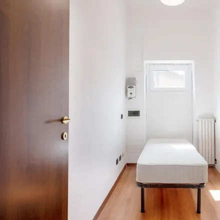 Rent this 5 bed room on Via Ernesto Teodoro Moneta in 7, 20161 Milan MI