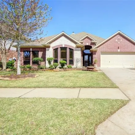 Rent this 4 bed house on 19026 Canyon Valley Drive in Harris County, TX 77377