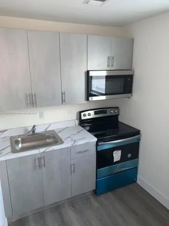 Rent this 1 bed apartment on 1231 Northwest 61st Street in Liberty Square, Miami