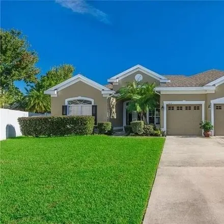 Rent this 4 bed house on 1699 Hookbill Court in Orange County, FL 32837