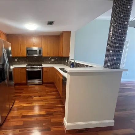 Rent this 2 bed condo on 10 Aragon Avenue in Coral Gables, FL 33134