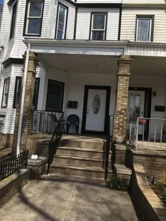 Rent this 4 bed apartment on 13 West 32nd Street in Bayonne, NJ 07002