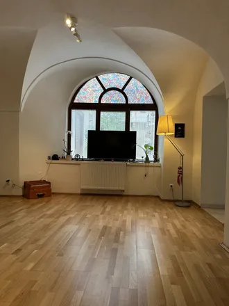 Rent this 1 bed apartment on palác Harbuval-Chamaré in Karmelitská, 118 00 Prague