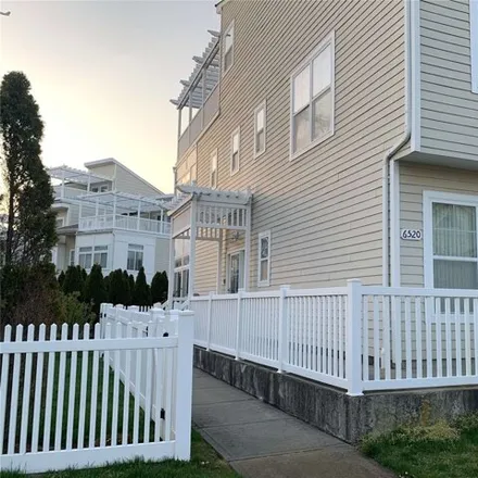 Buy this 4 bed townhouse on 6444 Seaspray Avenue in New York, NY 11692