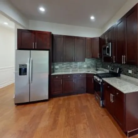 Buy this 7 bed apartment on 3912 West Congress Parkway in West Side, Chicago