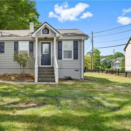 Buy this 2 bed house on 1155 Dell Avenue Southeast in Smyrna, GA 30080