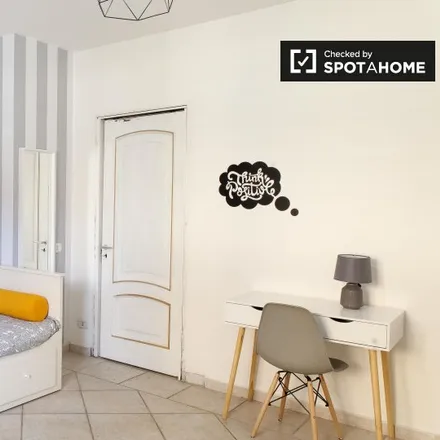 Rent this 4 bed room on Largo Tripi in 00132 Rome RM, Italy