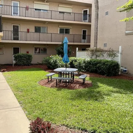 Rent this 2 bed condo on Shady Dell Riverview Condo in Melbourne, FL 32935