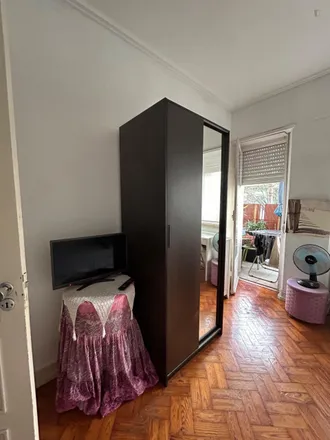 Rent this 5 bed room on Avenida Dom Rodrigo da Cunha 6 in 1950-037 Lisbon, Portugal