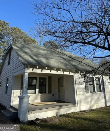 Rent this 3 bed house on 556 North Madison Avenue in Monroe, GA 30655