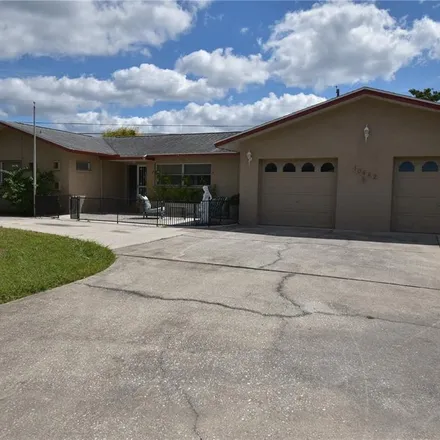 Buy this 2 bed house on 10440 Raffia Drive in Jasmine Estates, FL 34668