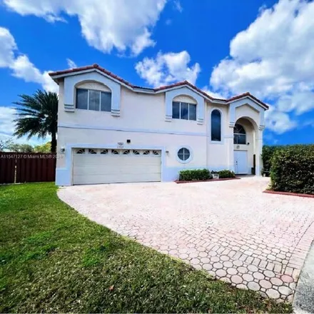 Buy this 4 bed house on 2503 Regalia Way in Cooper City, FL 33026