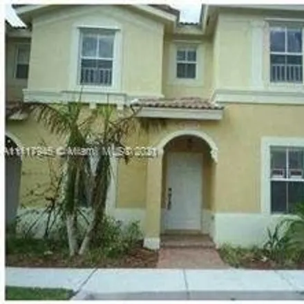 Rent this 2 bed townhouse on 12927 Southwest 31st Court