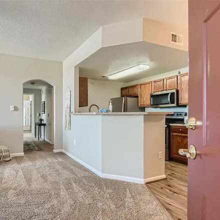 Rent this 2 bed condo on 7440 s blackhawk st