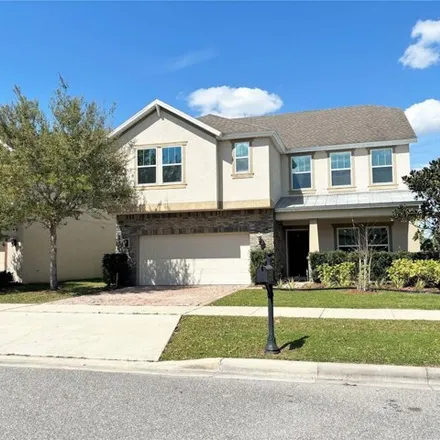 Rent this 4 bed house on 19367 Fallglo Drive in Orlando, FL 32827